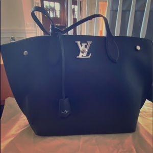 Louis Vuitton brand new lock me go bag
